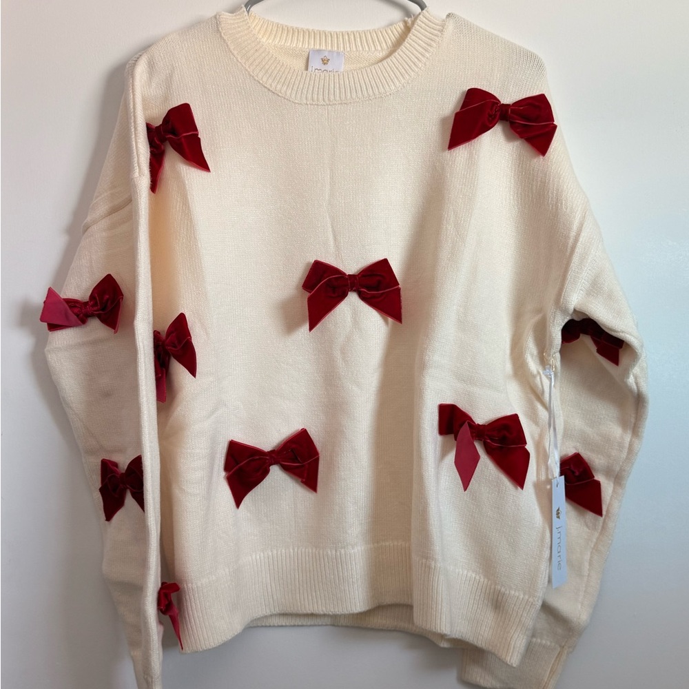 Elegant Cream Sweater with Red Bows